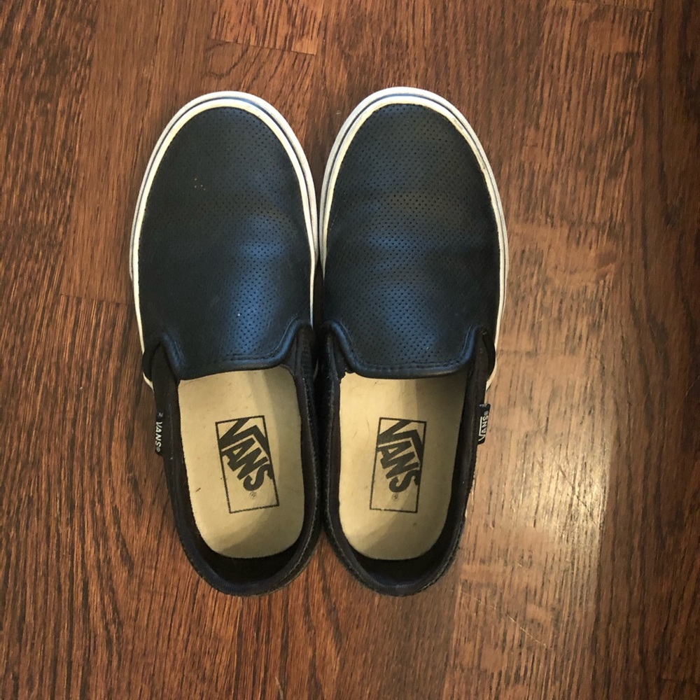 Vans black slip ons